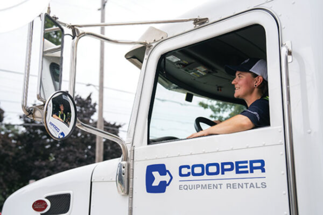 Cooper Equipment Rentals Delivery truck with driver.