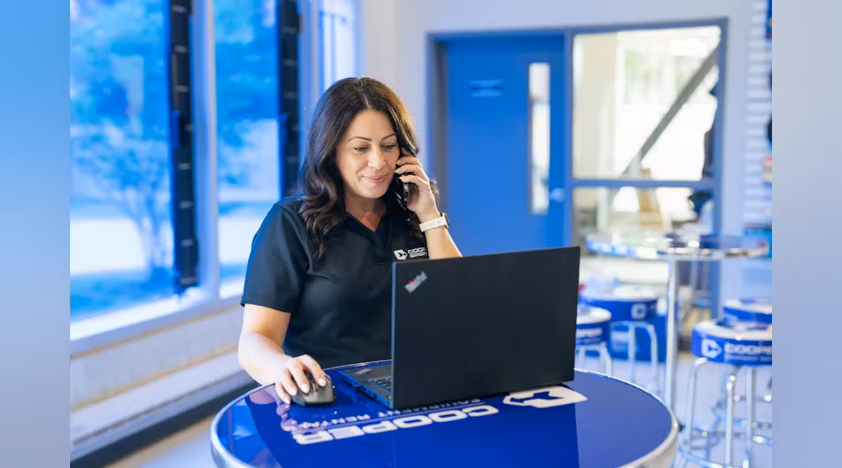 cooper equipment rentals, women on computer