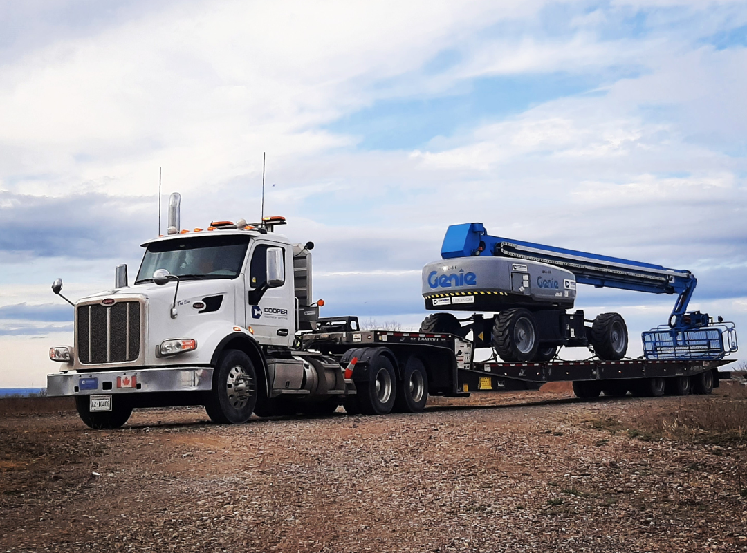 genie boom on a Cooper delivery truck